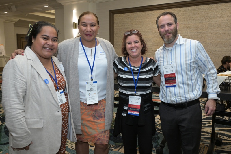 Standing Photo of 4 Summit Reception.jpg